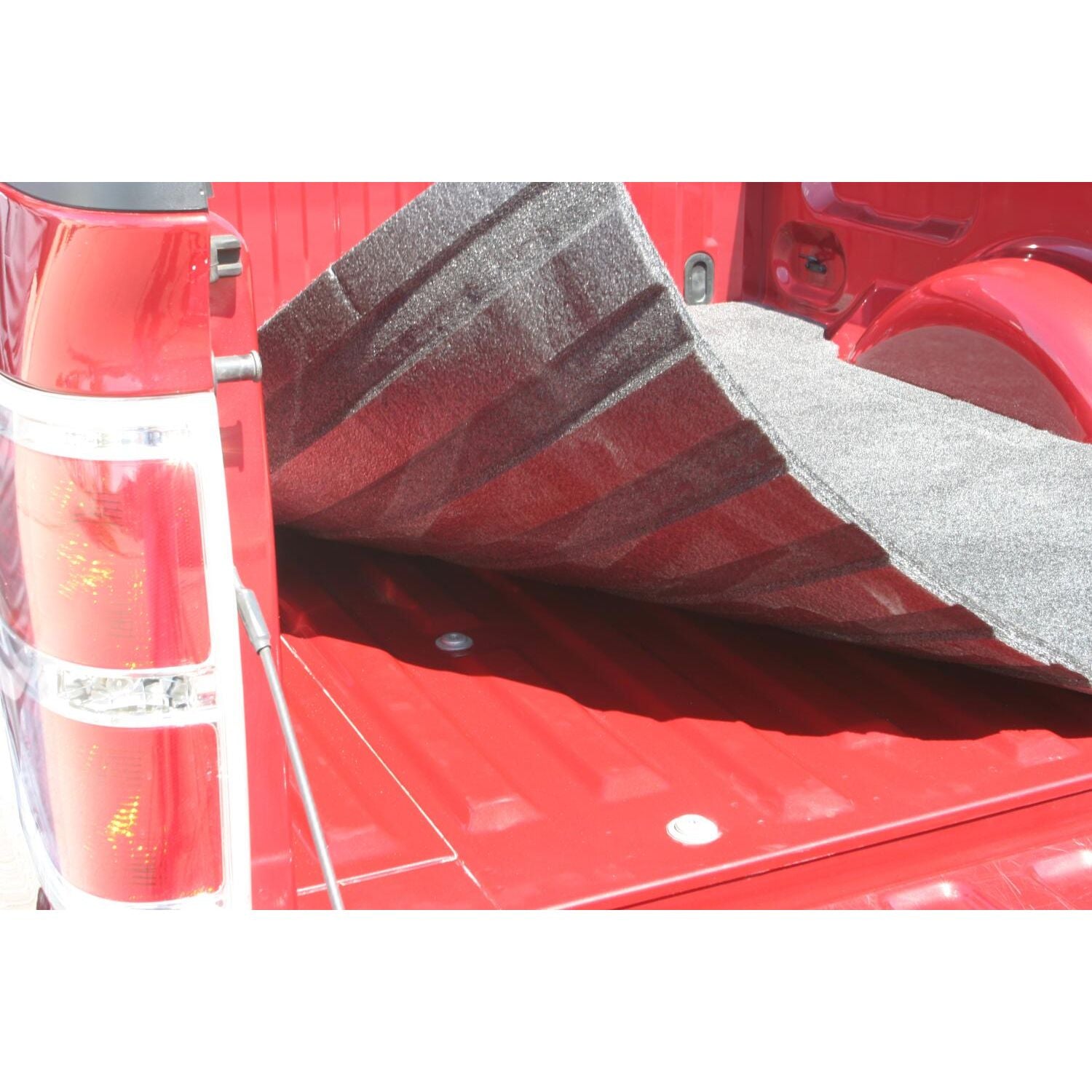 BedRug Bedmat For Spray-In Or No 2009-14 Ford F-150 5'6" Bed 3/4 Inch Thick Bed Mat - Charcoal (BMQ04SCS) shown in truck bed.