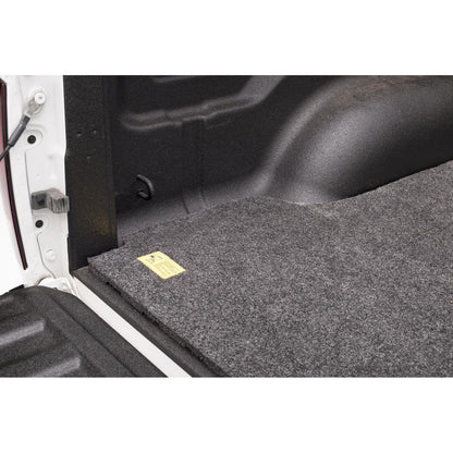 BedRug Bedmat For Spray-In Or No 2009-14 Ford F-150 5'6" Bed 3/4 Inch Thick Bed Mat - Charcoal (BMQ04SCS) installed in truck bed.