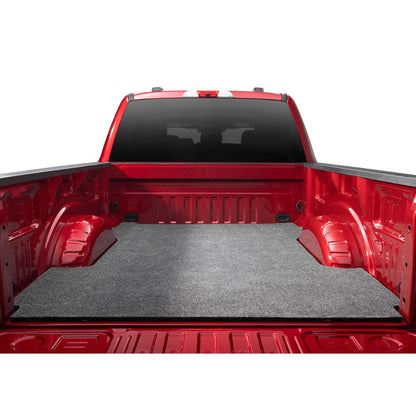 BedRug Bedmat For Spray-In Or No 17-26 Ford Super Duty 8' Bed 3/4 Inch Thick Bed Mat - Charcoal (BMQ17LBS) in a truck bed.