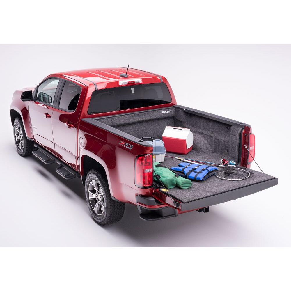 BedRug 15-22 Colorado/Canyon Crew Cab 5' Bed Liner w/ Tailgate Mat - Charcoal (BRB15CCK) shown in red truck bed with gear.