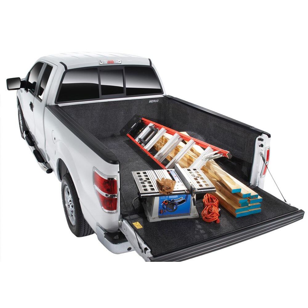 BedRug 07-18 Silverado/Sierra 5'8" Bed w/o Cargo Channel System Bed Liner w/ Tailgate Mat - Charcoal (BRC07CCK) installed in truck bed.