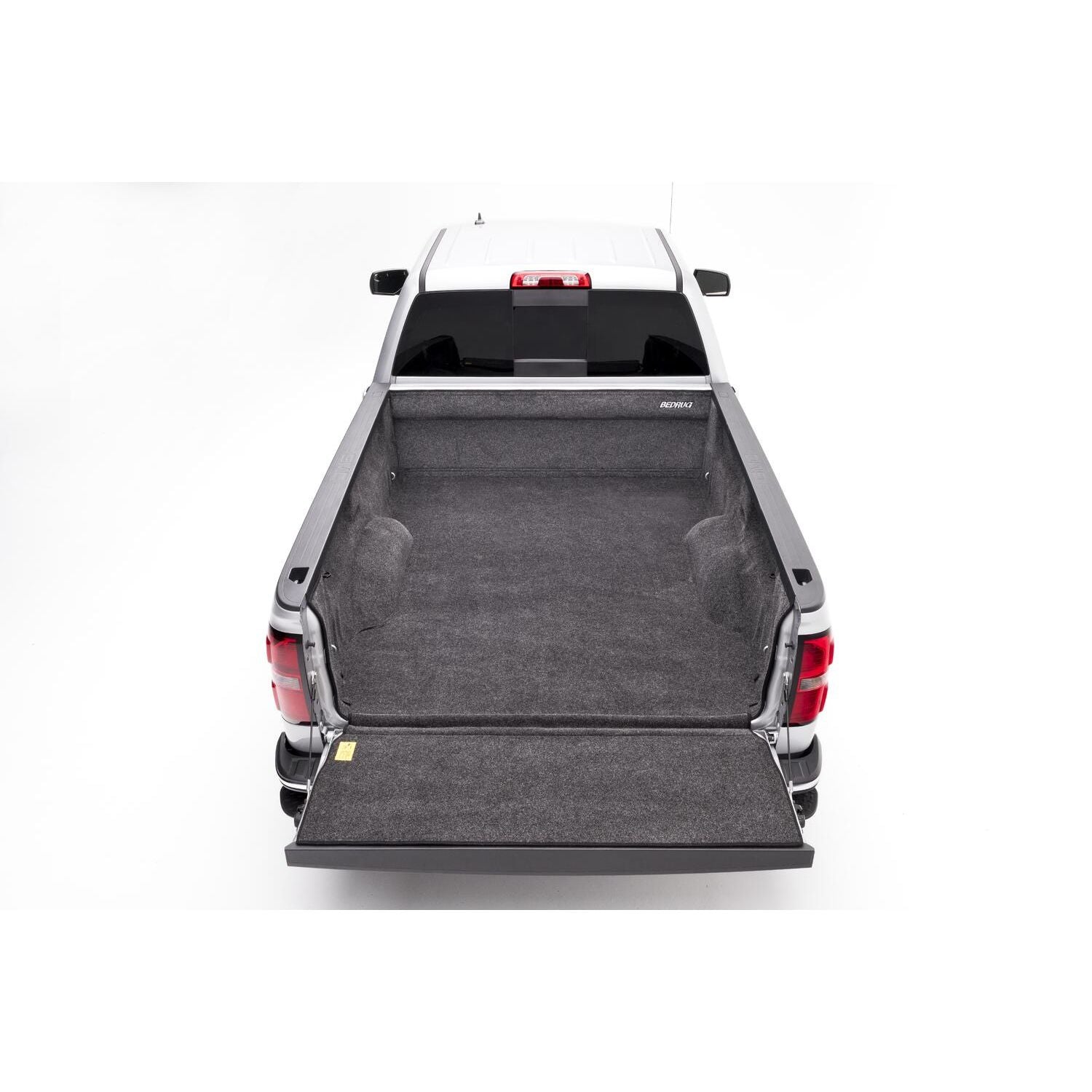 BedRug 07-18 Silverado/Sierra 8' Bed w/o Cargo Channel System Bed Liner w/ Tailgate Mat - Charcoal (BRC07LBK) installed in truck bed.