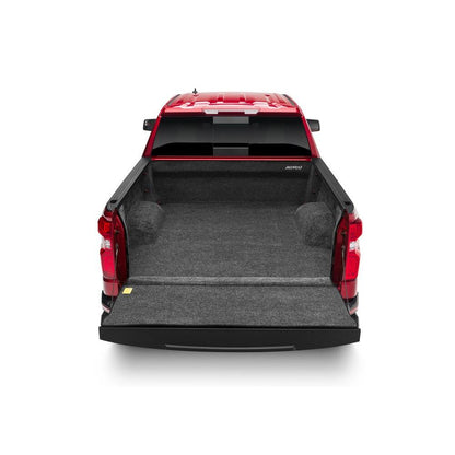 BedRug Truck 20+ Silverado/Sierra 2500 Hd/3500 HD 8' Bed w/o Multi-Pro Tailgate Bed Liner w/ Tailgate Mat - Charcoal (BRC20LBK) installed in truck bed.