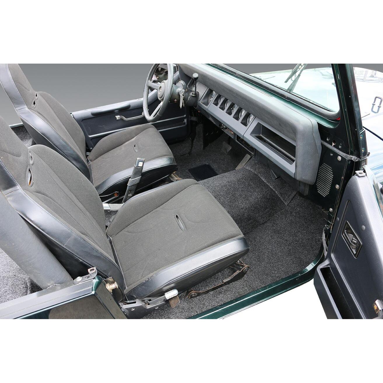 BedRug Jeep 76-95 Jeep Cj-7/Yj Front Kit 8Pc Floor Kit - Charcoal (Includes Heat Shields) Floor Liner Kit 8 pc. Front Kit Includes Heat Shields Bed Liner installed in Jeep interior.