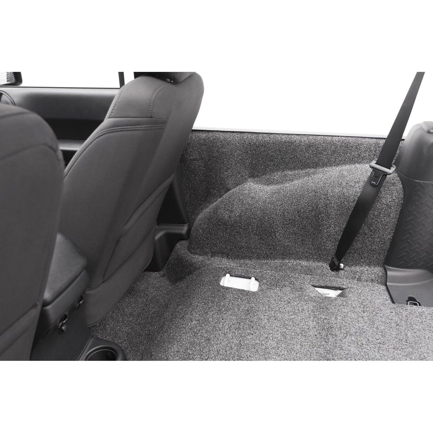 BedRug Jeep 07-10 Jeep JK 2Dr Rear 5Pc Cargo Kit - Charcoal installed in rear seating area.