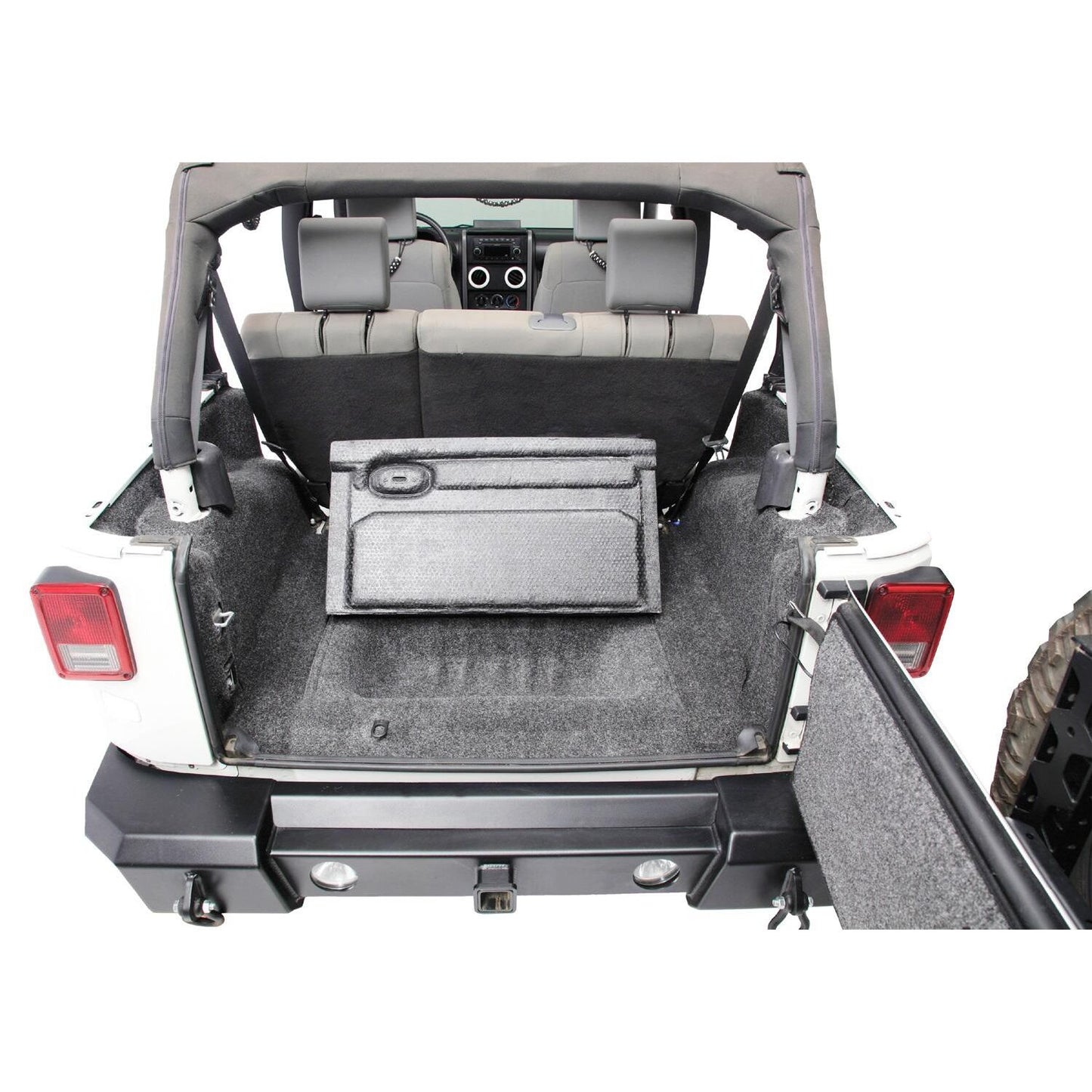 BedRug Jeep 07-10 JK Unltd 4Dr RR 5Pc Cargo Kit - Charcoal (Inc Tlgte & Tub Liner) installed in rear cargo area.