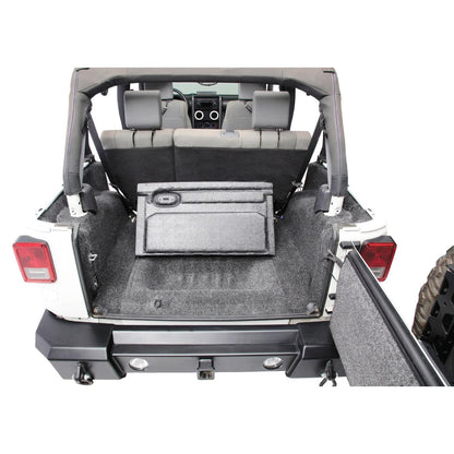 BedRug Jeep 07-10 JK Unltd 4Dr RR 5Pc Cargo Kit - Charcoal (Inc Tlgte & Tub Liner) installed in rear cargo area.