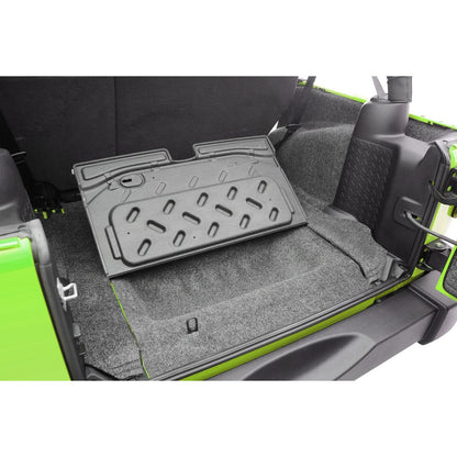 BedRug Jeep 07-10 JK Unltd 4Dr RR 5Pc Cargo Kit - Charcoal (Inc Tlgte & Tub Liner) installed in Jeep cargo area.