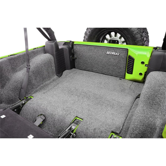 BedRug Jeep 11-18 Jeep JK 2Dr Rear 5Pc Cargo Kit - Charcoal (Includes Tailgate & Tub Liner) installed in Jeep interior.