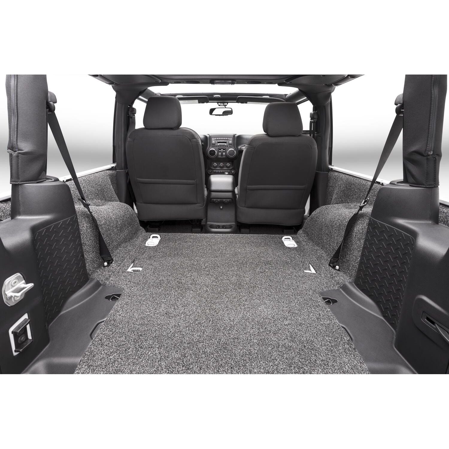 BedRug Jeep 11-18 Jeep JK 2Dr Rear 5Pc Cargo Kit - Charcoal installed in the back of a Jeep JK.