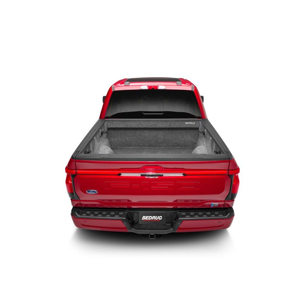 BedRug 22-25 Ford Maverick Bed Liner w/ Tailgate Mat - Charcoal (BRM22SBK) installed in a red Ford truck bed.