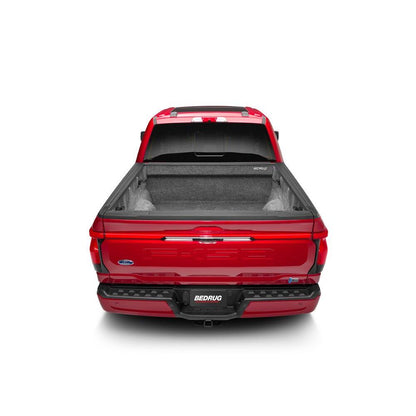 BedRug 22-25 Ford Maverick Bed Liner w/ Tailgate Mat - Charcoal (BRM22SBK) installed in a red Ford truck bed.
