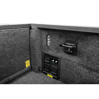 Interior view of BedRug 22-25 Ford Maverick Bed Liner w/ Tailgate Mat - Charcoal (BRM22SBK) with accessories and lighting.