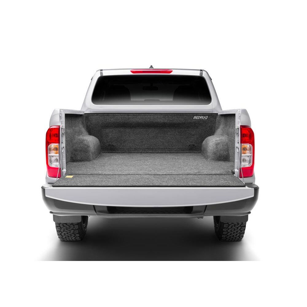 BedRug 04+ Nissan Titan Crew Cab 5.5' Bed Liner w/ Tailgate Mat - Charcoal (BRN04CCK) installed in truck bed.