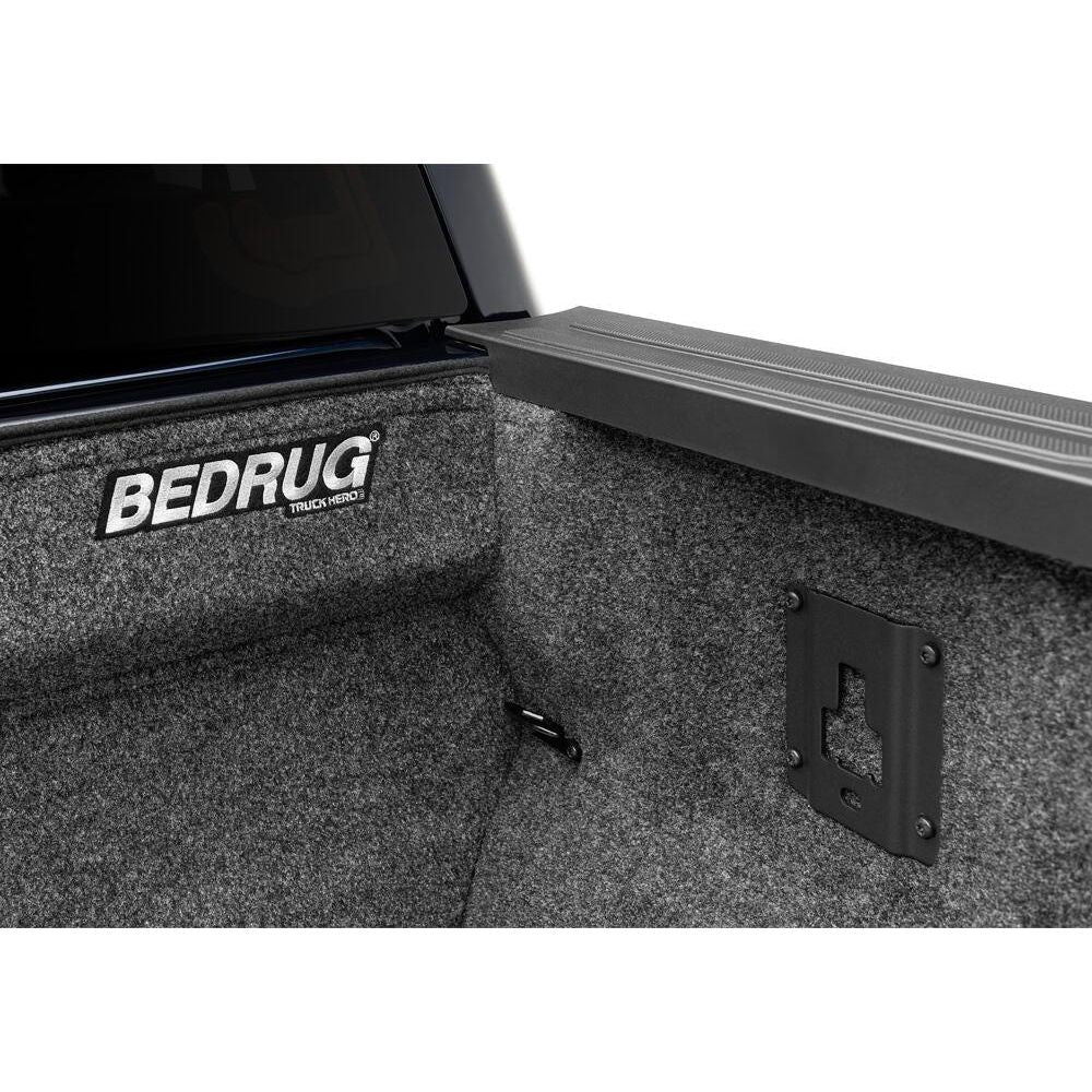 BedRug 2015-2025 Ford F-150 8' Bed Liner w/ Tailgate Mat - Charcoal (BRQ15LBK) close-up showing truck bed interior with BedRug branding.