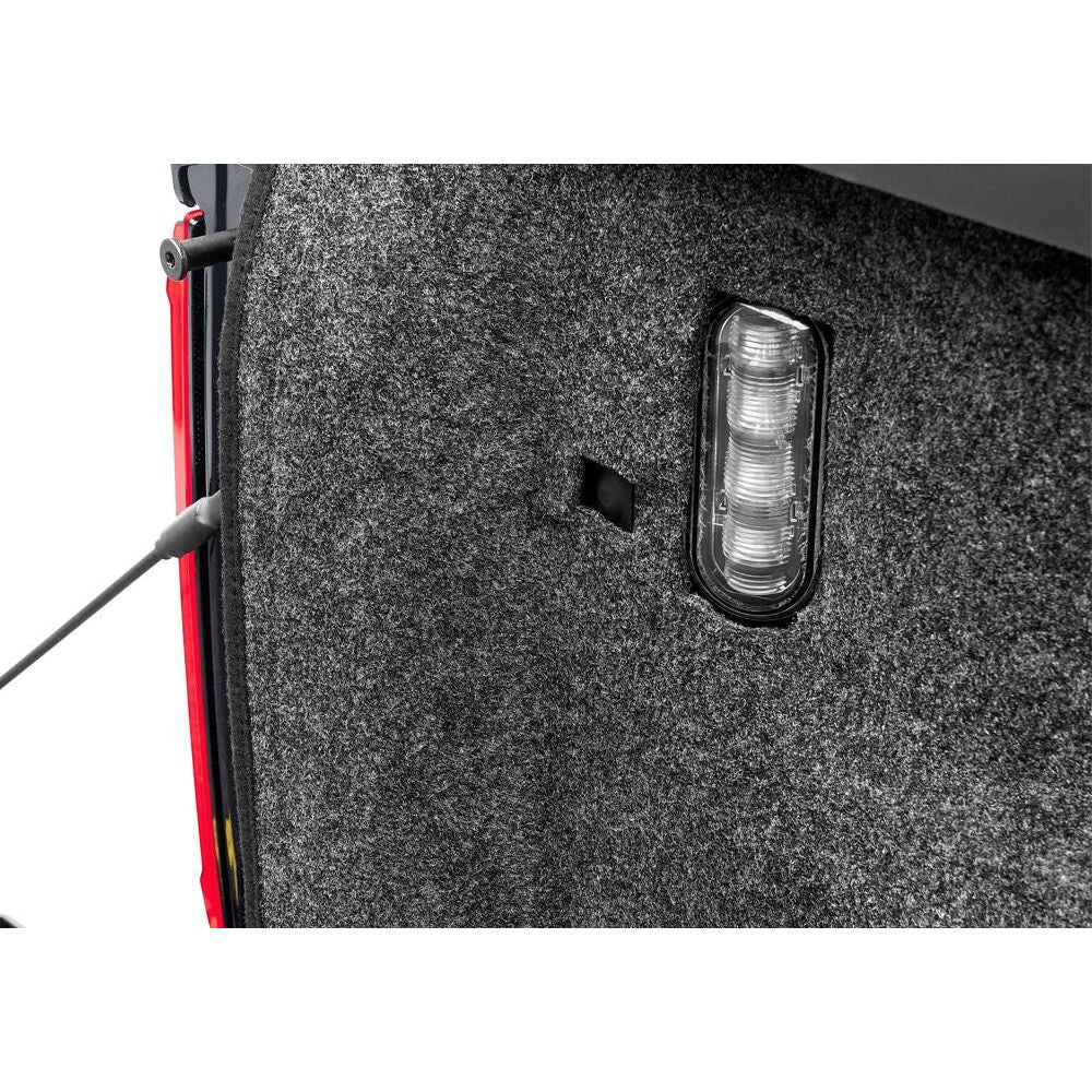 BedRug 2015-2025 Ford F-150 6'7" Bed Liner w/ Tailgate Mat - Charcoal (BRQ15SBK) close-up showing textured material and light