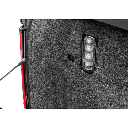 BedRug 2015-2025 Ford F-150 6'7" Bed Liner w/ Tailgate Mat - Charcoal (BRQ15SBK) close-up showing textured material and light