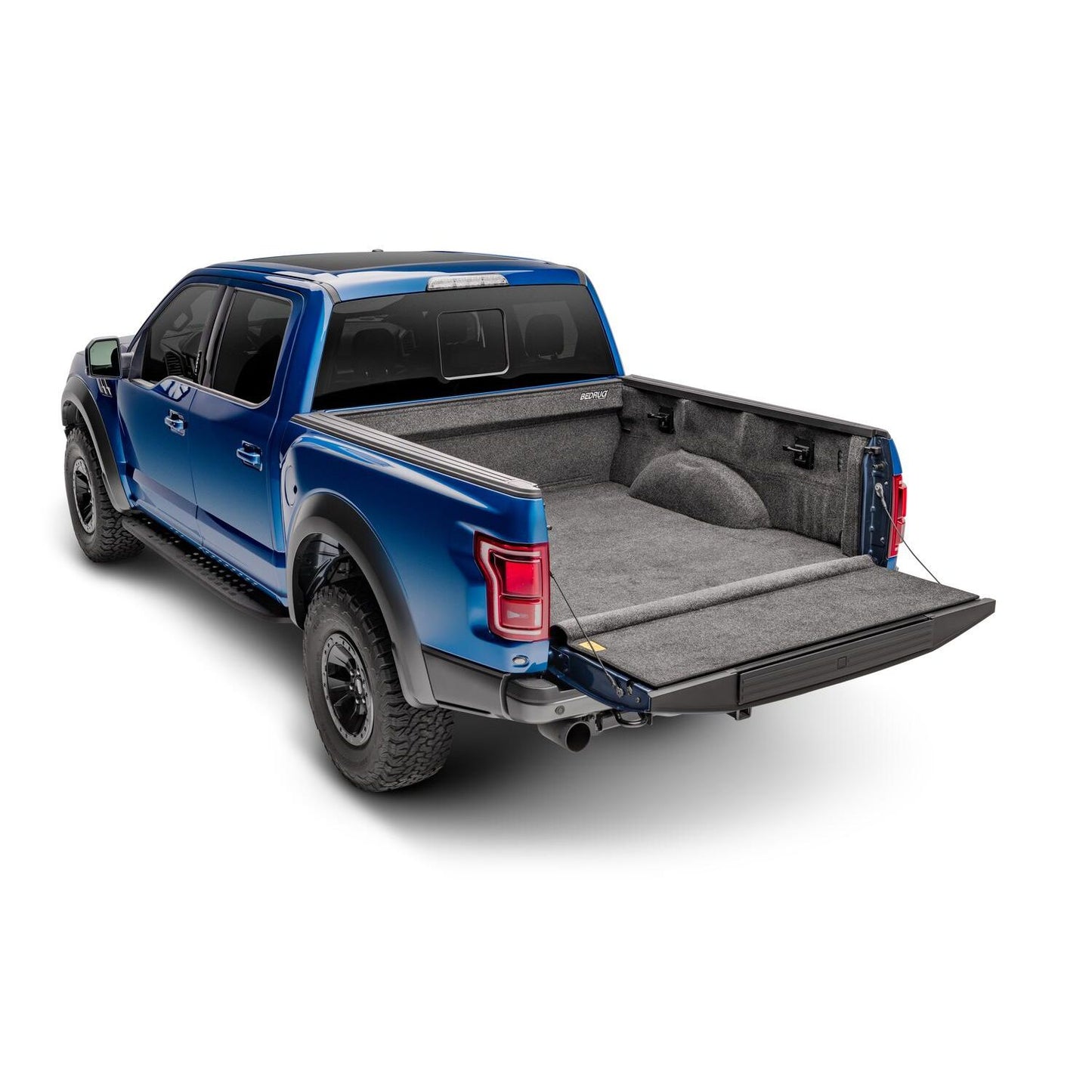 BedRug 17+ Ford Super Duty 6.5' Bed Liner w/ Tailgate Mat - Charcoal (BRQ17SBK) installed in a blue truck bed.