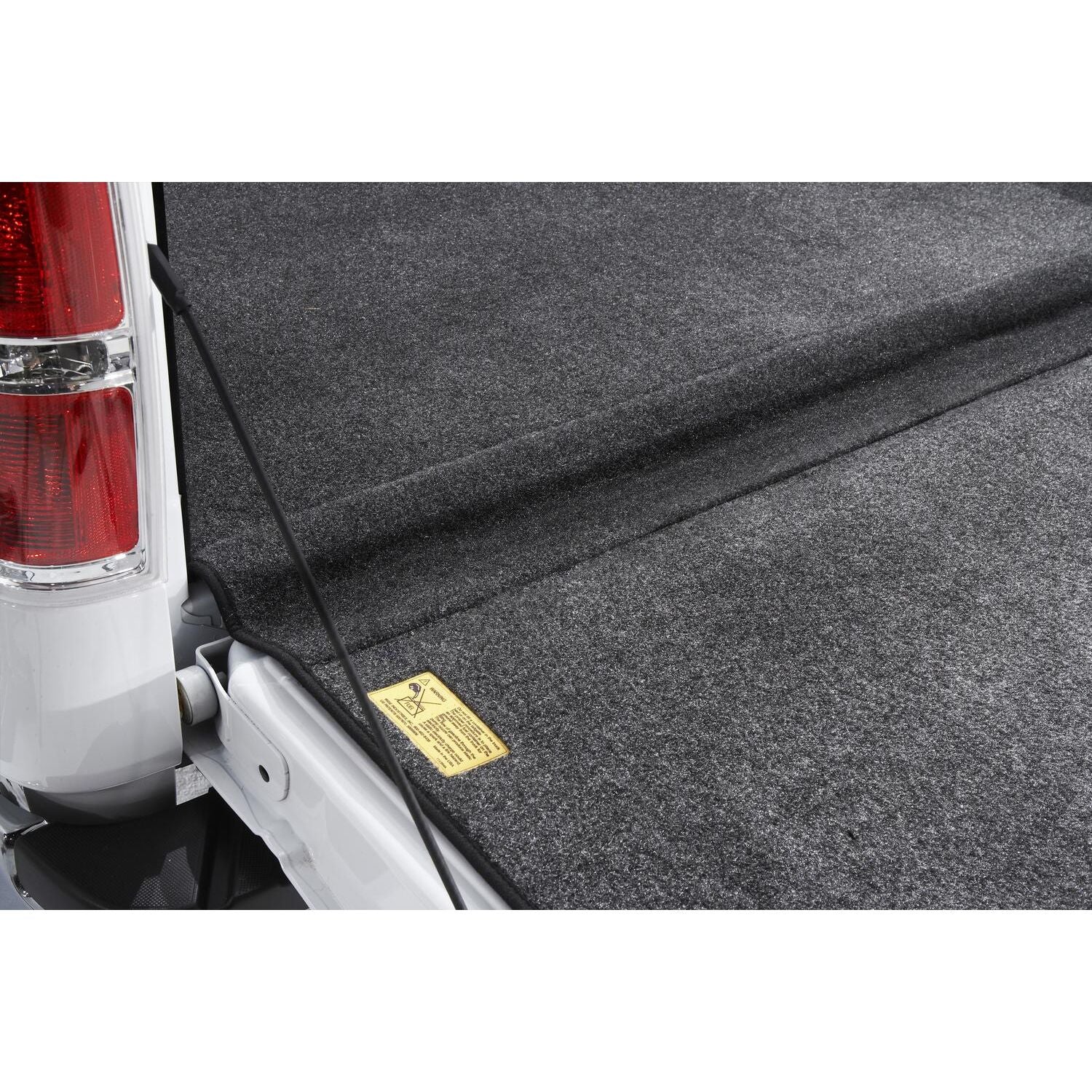 BedRug 99-16 Ford Super Duty 8.0' Bed w/o Factory Step Gate Bed Liner w/ Tailgate Mat - Charcoal (BRQ99LBK) installed in truck bed.