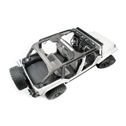 BedRug Jeep Bedtred 11-18 JK Unltd 4Dr Rear 5Pc Cargo Kit Rear Kit Incl. Drivers Wheel Well/ Passengers Wheel Well/ Rear Cargo Floor/ Tailgate And Tub Liner Bed Liner - Charcoal (BTJK11R4) installed in a Jeep interior.