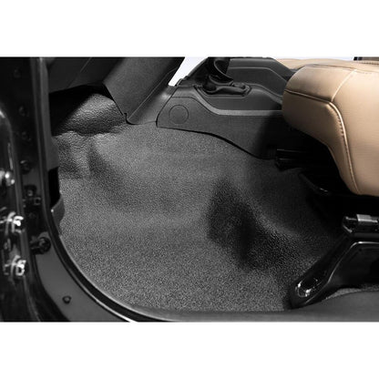 BedRug 2018-2026 Jeep Wrangler 2 Door Bed Liner - Charcoal (BTJL18F2) installed in a Jeep interior.