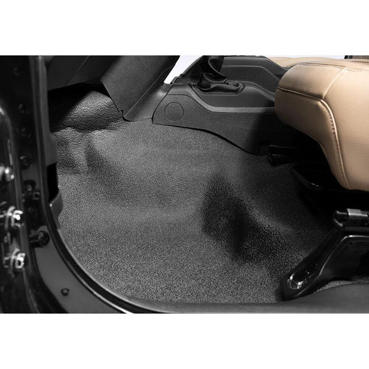 BedRug 2018-2026 Jeep Wrangler 4 Door Bed Liner - Charcoal (BTJL18F4) installed in vehicle interior.