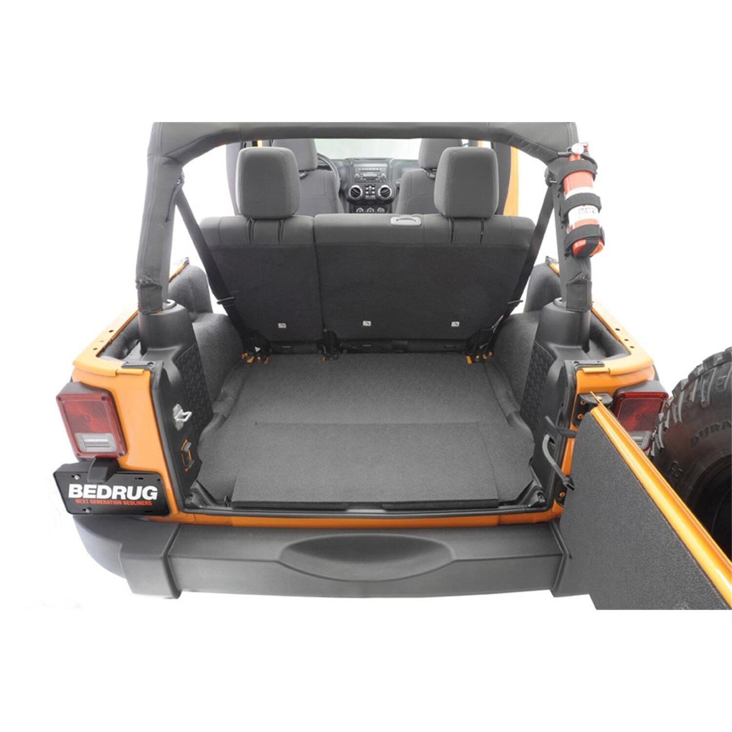 BedRug Jeep Bedtred 03-06 Jeep LJ Unltd Rear 4Pc Cargo Kit Incl. Driver Left Hand Panel Passenger Right HandPanel Cargo Area Tailgate Replaces Factory Carpet Kit Bed Liner - Charcoal (BTLJ04R) in an orange Jeep.
