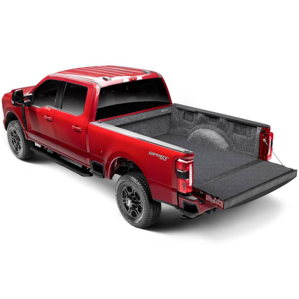 BedRug 17-23 Ford Super Duty 6'6" Bed Impact Bed Liner w/ Tailgate Mat - Charcoal (ILQ17SBK) installed in a red truck.