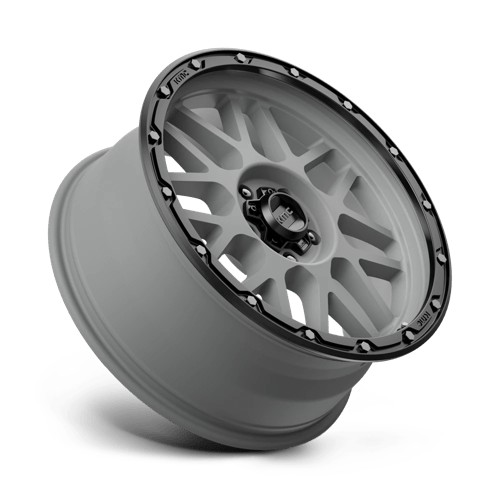 KMC KM535 GRENADE OFF-ROAD Matte Gray W/ Matte Black Lip wheel showcasing aggressive design and rugged capability.