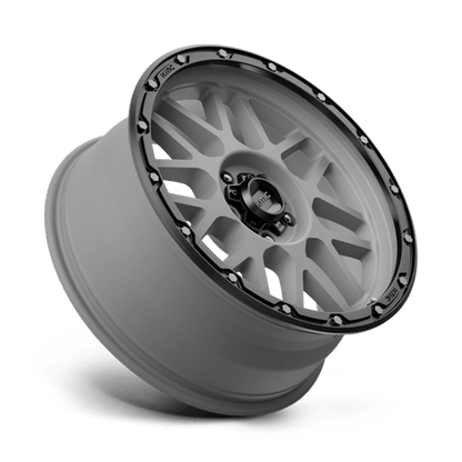 KMC KM535 GRENADE OFF-ROAD Matte Gray W/ Matte Black Lip wheel showcasing aggressive design and rugged capability.