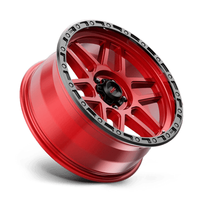 KMC KM544 MESA Candy Red W/ Black Lip wheel showcasing its rugged design and bold color.