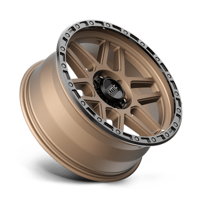 KMC KM544 MESA Matte Bronze W/ Black Lip wheel showcasing rugged design and strength.