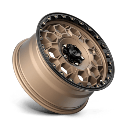 KMC KM545 TREK Matte Bronze W/ Black Lip wheel showcasing rugged design and performance.