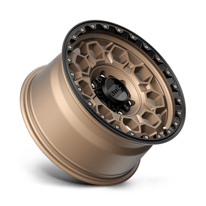 KMC KM545 TREK Matte Bronze W/ Black Lip wheel showcasing rugged design and off-road capability.
