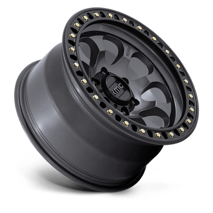 KMC KM550 RIOT SBL Anthracite W/ Satin Black Lip wheel featuring aggressive styling and durable construction.