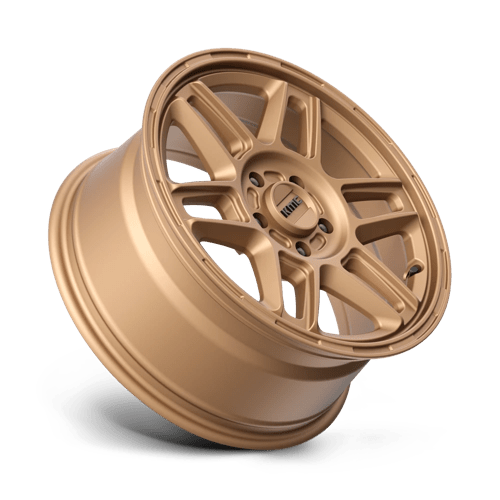 KMC KM716 NOMAD Matte Bronze wheel showcasing a rugged design perfect for off-road adventures.