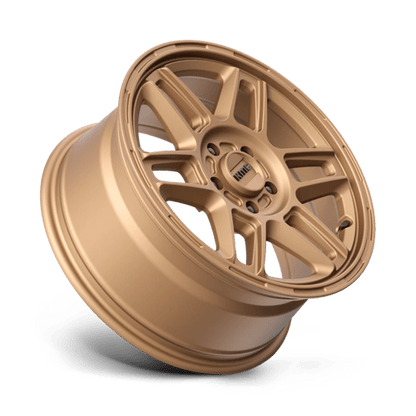 KMC KM716 NOMAD Matte Bronze wheel showcasing a rugged design perfect for off-road adventures.