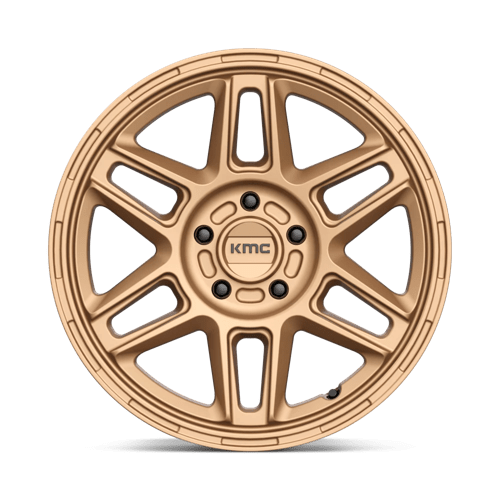 KMC KM716 NOMAD Matte Bronze wheel showcasing a bold design for off-road adventures.