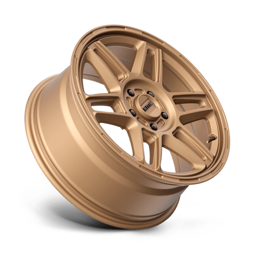 KMC KM716 NOMAD Matte Bronze wheel showcases a bold and rugged design for off-road performance.