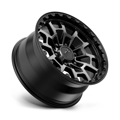 KMC KM718 SUMMIT Satin Black W/ Gray Tint wheel showcasing rugged design and performance for off-road enthusiasts.