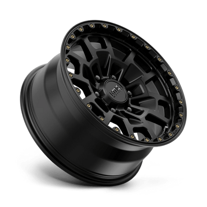 KMC KM718 SUMMIT Satin Black wheel showcasing rugged design and durability for off-road and performance vehicles.