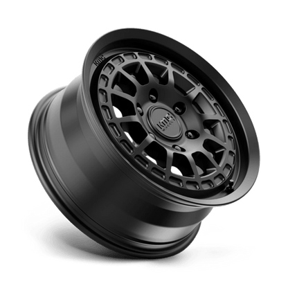 KMC KM719 CANYON Satin Black wheel showcasing rugged design and aggressive style.