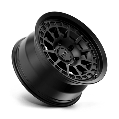 KMC KM719 CANYON Satin Black wheel showcasing rugged design and aggressive aesthetics for off-road adventures.