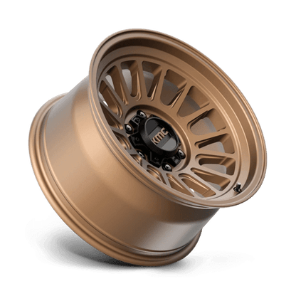 KMC KM724 IMPACT OL Matte Bronze rugged wheel for off-road trucks and vehicles, showcasing aggressive design and durability