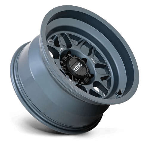 KMC KM725 TERRA Metallic Blue wheel showcasing its rugged design and style for off-road vehicles.