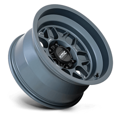 KMC KM725 TERRA Metallic Blue wheel showcasing its rugged design and style for off-road vehicles.