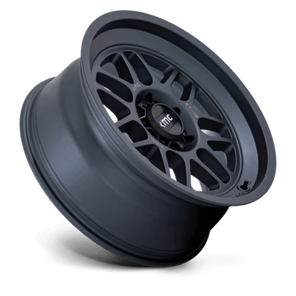 KMC KM725 TERRA Metallic Blue wheel showcasing its rugged design and aggressive styling for off-road vehicles.