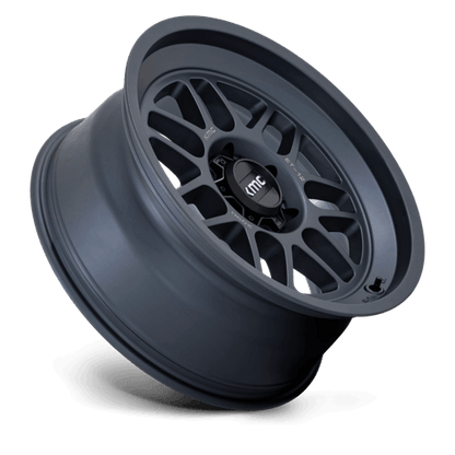 KMC KM725 TERRA Metallic Blue wheel showcasing rugged design and bold styling for off-road vehicles.