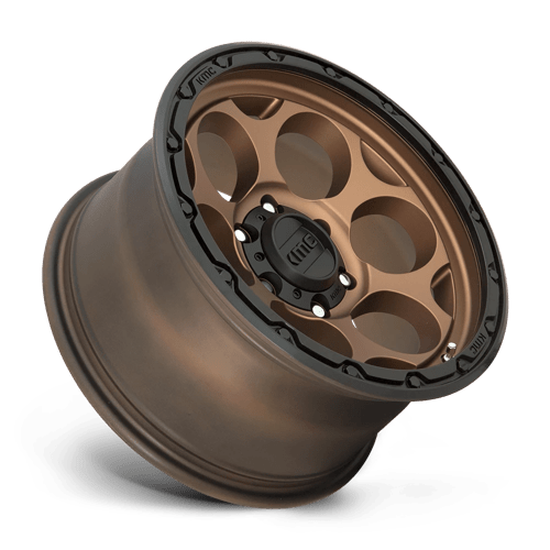 KMC KM541 DIRTY HARRY Matte Bronze W/ Black Lip wheel showcasing rugged design and bold aesthetics.