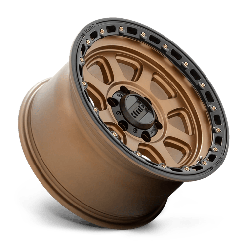 KMC KM548 CHASE Matte Bronze W/ Black Lip wheel showcasing aggressive design and off-road durability.